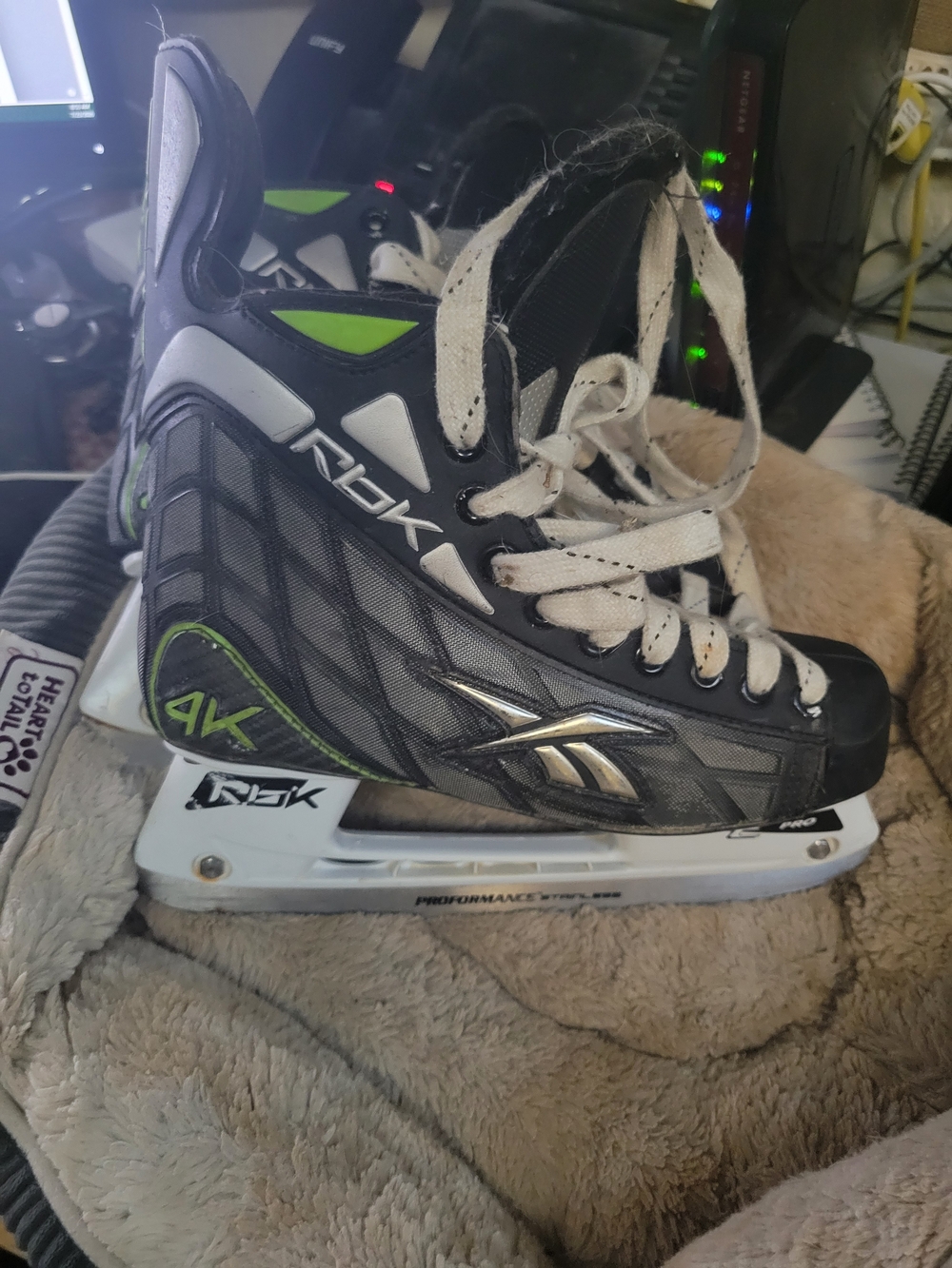 Reebok Men's/Youth Hockey Skate in Black with Green Accents